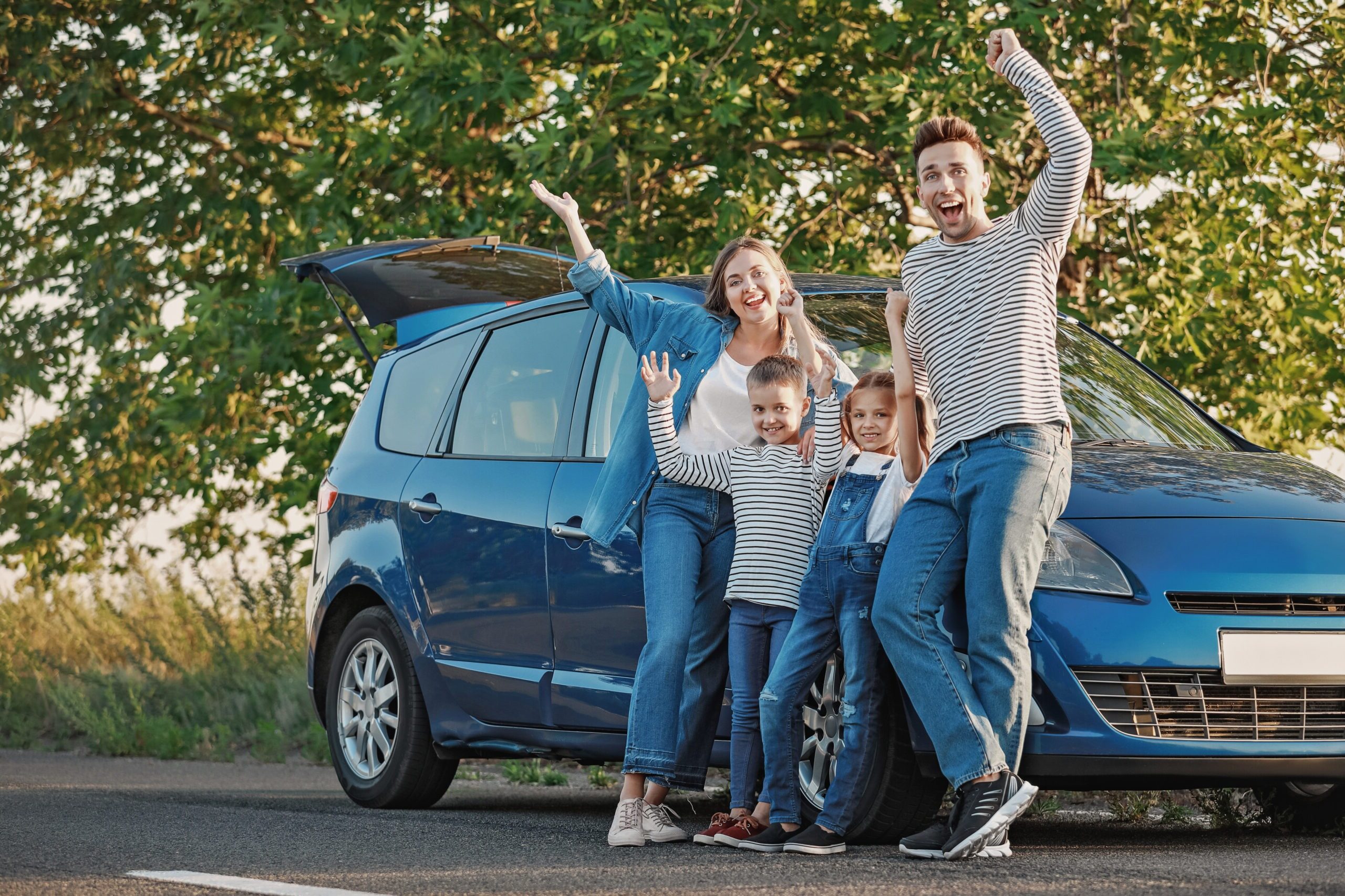 Happy family near car outdoors